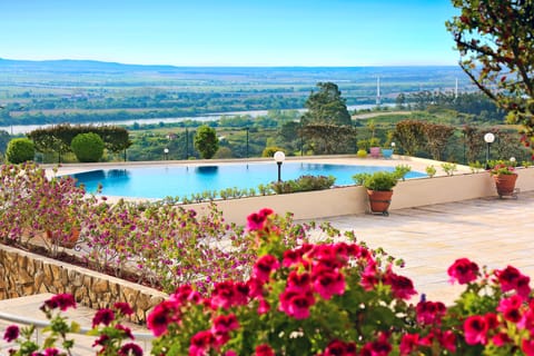 Indoor pool, seasonal outdoor pool, pool umbrellas, sun loungers