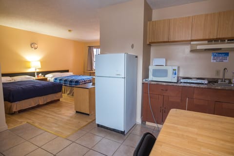 Deluxe Room, 2 Double Beds, Non Smoking, Kitchenette | Private kitchen | Fridge, microwave