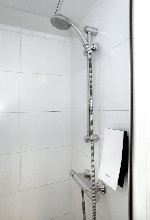 Shower, eco-friendly toiletries, hair dryer, towels