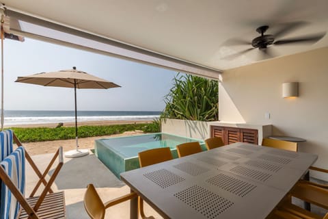 Relax in your exclusive plunge pool while enjoying an al fresco dining experience with ocean breezes.