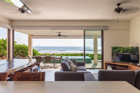 Unwind in this comfortable lounge area, featuring plush seating and breathtaking ocean views.