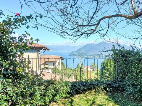 Sky, Plant, Water, Natural Landscape, Building, Window, Vegetation, Land Lot, Grass, Wood