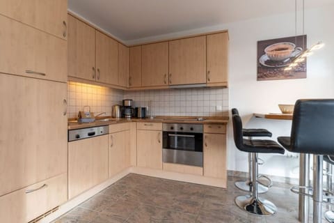 Deluxe Apartment, 2 Bedrooms | Private kitchen | Fridge, microwave, oven, dishwasher