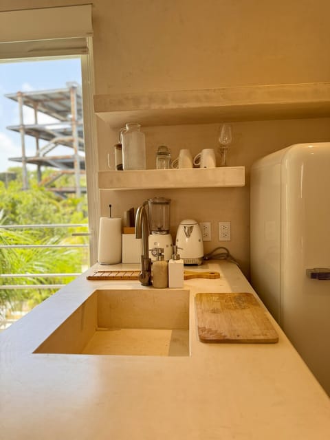 Luxury Suite | Private kitchen | Full-size fridge, microwave, oven, stovetop