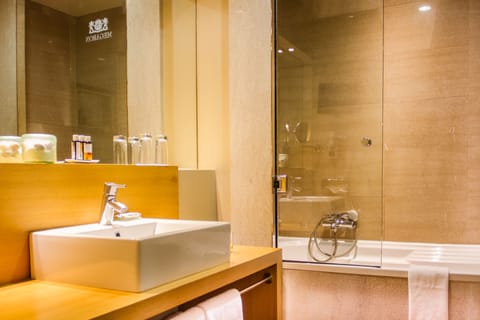 Designer toiletries, hair dryer, bathrobes, slippers