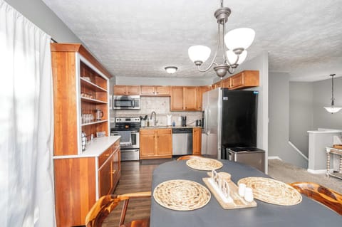 Gather for meals together at the dining table, with seating for 4