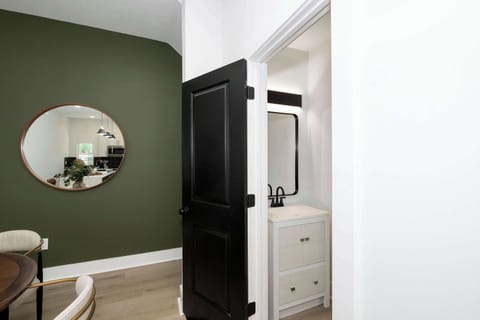 A convenient half bathroom is available on the main level