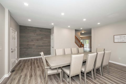 Gather for meals together at the dining table, with space for the whole crew!