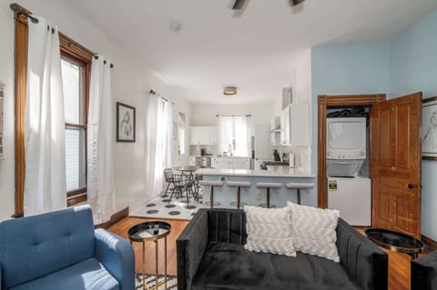 Living, dining, kitchen, and laundry area