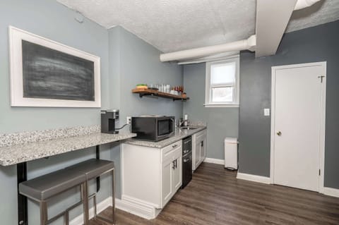 The streamlined kitchenette is well-equipped for your visit