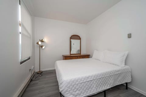 Suite 2: The bedroom retreat features a plush queen-sized bed & large dresser