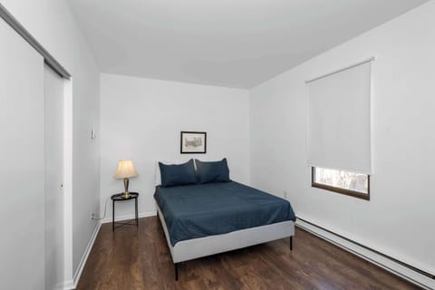 Suite 1: The serene bedroom retreat features a plush queen-sized bed