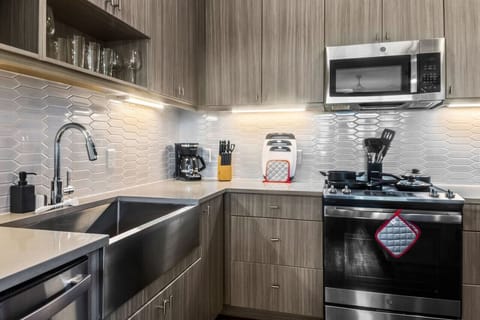 As you step into the kitchen, the clean lines and functional design make you eager to start cooking your favorite dishes.