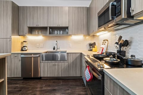 As you step into the kitchen, the clean lines and functional design make you eager to start cooking your favorite dishes.