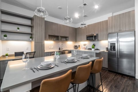 You are surrounded by tasteful decor and warm tones, making the dining room a perfect setting for any occasion.