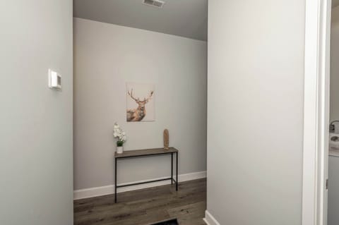 A tranquil entry way welcomes you to your Covington home away from home