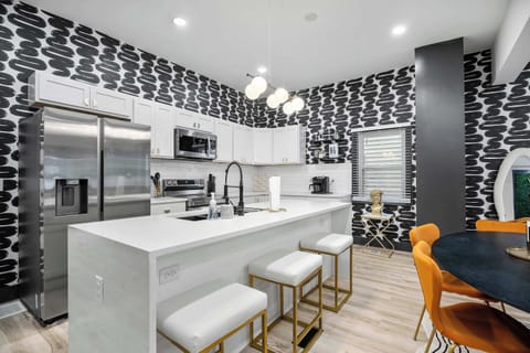 Dining table with seating for 6 and additional counter seating for 3