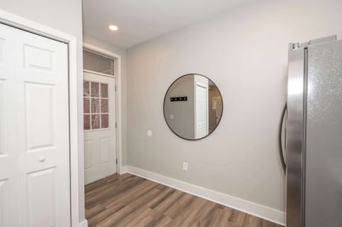 Enter this main-level condo into the sleek, updated kitchen