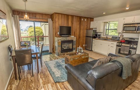 Superior Cottage, Ocean View | Living area | Flat-screen TV, DVD player