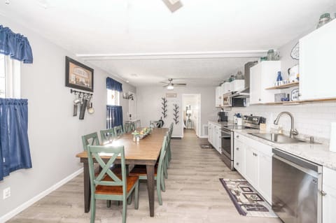 The expansive eat-in kitchen provides ample space and all the comforts of home