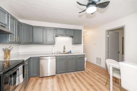 Apartment 1’s elegant kitchen offers ample space & all the comforts of home