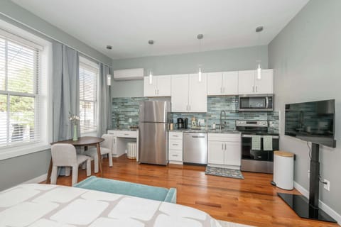 Suite 2’s sleek, fully equipped kitchen offers every comfort of home