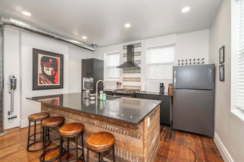 Sip morning coffee or grab a bite at the kitchen counter, with seating for 4