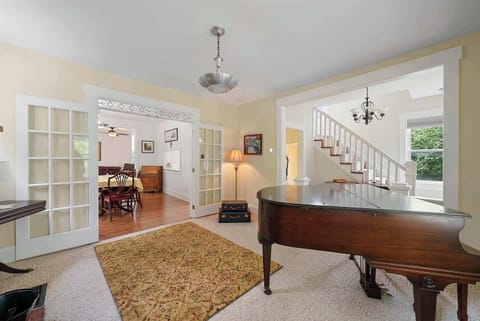 Enjoy timeless, elegant decor & ample space throughout this charming home