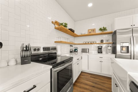 The kitchen is equipped with all the cookware, cutlery & appliances you need.