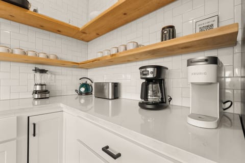 The kitchen is equipped with all the cookware, cutlery & appliances you need.