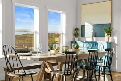 The dining table comfortably seats 10 guests.