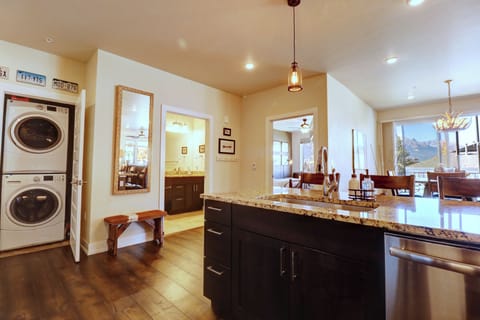 The main living area features a full bath, right off of the entryway.
