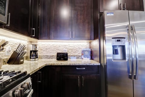 Beautifully updated kitchen with stainless steel appliances.