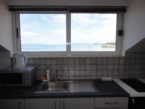 Apartment, 1 Bedroom, Sea View | Private kitchenette | Mini-fridge, electric kettle