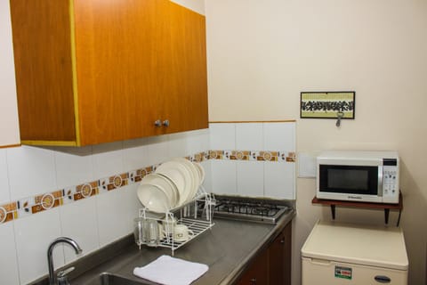 Apartment 1 Bedroom 3 Adults | Private kitchen | Fridge, microwave, stovetop, coffee/tea maker