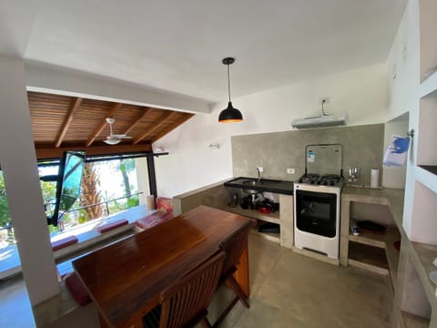 Basic Villa | Private kitchen | Fridge, microwave, toaster, cookware/dishes/utensils