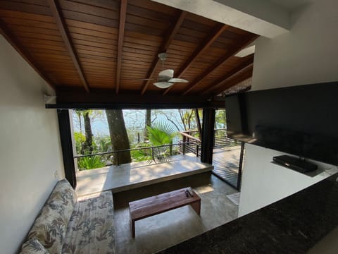 Basic Villa | Living area | 50-inch Smart TV with satellite channels