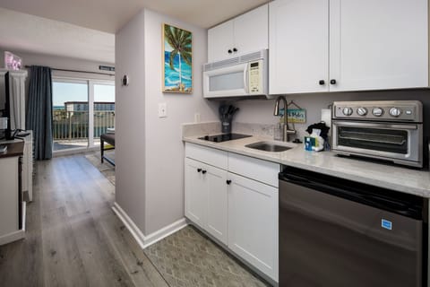 Kitchenette. Minifridge (no freezer), toaster oven, stove, sink, microwave