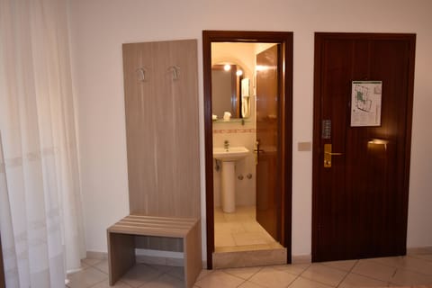 Economy Double Room | In-room safe, desk, iron/ironing board, free WiFi