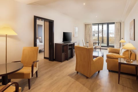 Junior Suite, Terrace | Minibar, in-room safe, desk, iron/ironing board