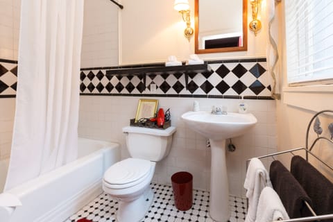 Room, 1 Queen Bed (Red Room) | Bathroom | Free toiletries, hair dryer, towels