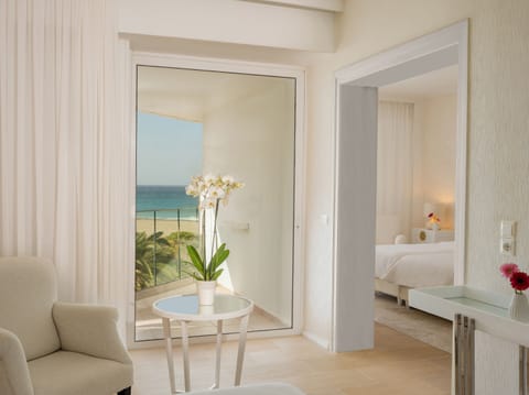 Family Suite, Sea View (Main Building) | Minibar, in-room safe, blackout drapes, iron/ironing board