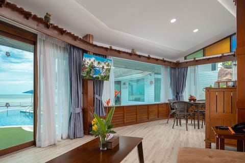 Ocean View Pool Access Villa | Living area | 32-inch LCD TV with satellite channels, TV, DVD player