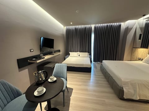 Family Room, 1 Bedroom | 1 bedroom, Egyptian cotton sheets, premium bedding, minibar