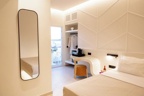 Deluxe Triple Room, Balcony, Sea View | In-room safe, blackout drapes, soundproofing, iron/ironing board