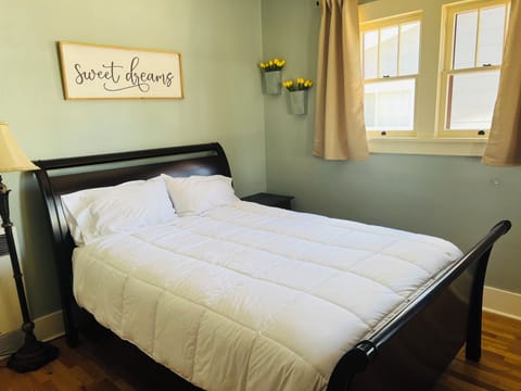 Bedroom 3. Front bedroom with Queen Crate and Barrel bed.