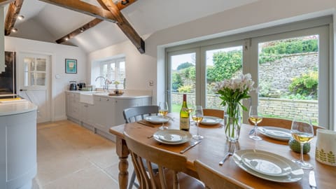 Dine beside garden views and bring the outdoors in