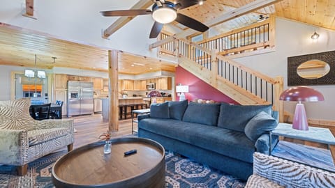 Enjoy the bright, spacious living area with high ceilings and modern décor.