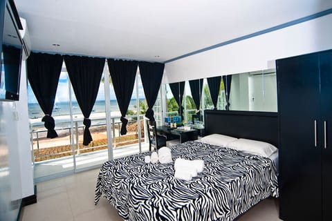 2nd Floor Ocean View Family Suite | Hypo-allergenic bedding, minibar, in-room safe, desk