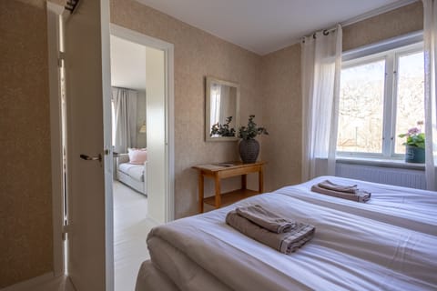 Room, 2 Bedrooms, Private Bathroom, Sea View | Individually decorated, iron/ironing board, free WiFi, bed sheets